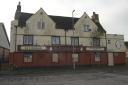 The derelict Unicorn pub after a fire in Melksham