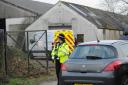 A police investigation is taking place at farm buildings on the Ashton Road near Hilperton.