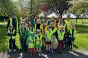 The Kingswood litter pick group dressed in high-vis and armed with litter pickers