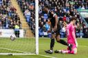 Cameron Jerome scores Bolton's third goal of the day at Peterborough United
