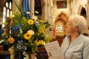 Magna Carta festival of Flowers. Flower lady Pam Griffin takes a close look at one of the many displays at St James Church Trowbridge a Festival of Flowers in celebration of the 800th Anniversary of the Magna Carta Pics Trevor Porter 51658 2 (32787145)