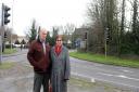 Councillors Bill Douglas and Desna Allan in front of the Bridge Centre roundabout, which could be disappearing