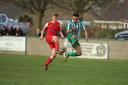 Action from the 3-2 defeat for Corsham Town (red) against Westbury United. PICTURE: JOHN CUTHBERTSON