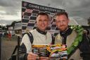 Melksham drivers Adrian Slade and Simon Thornton-Norris totting up their championship points after their successful drives in the Saloon Car Championship at Castle Combe's Bank Holiday meeting. Photo Trevor Porter 59830 7..