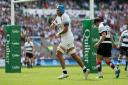 England's Zach Mercer celebrates scoring his sides third try during the Quilter Cup match between England and the Barbarians at Twickenham Stadium, London.