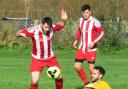 Action from the Division One clash between New Inn Wacker (red and white) and Lion & Fiddle in the Chippenham & District Sunday League. PICTURE: CADER ESOOF