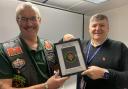 Brian Waymont of the Armed Forces Bikers Wessex Brigade hands over unusual award