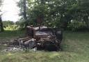 A burnt vehicle, taken in May 2022, near Hostomel Airport, which is a one hour drive from central Kyiv.