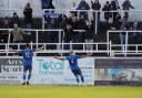 Chippenham Town defender Spencer Hamilton celebrates a rare goal in front of the travelling fans on Boxing Day                Photo: Richard Chappell