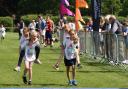 Children from 26  schools took part in a triathlon to raise money for charity