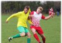 Action from the clash between AFC Melksham (yellow) and Box Rovers. PICTURE: CADER ESOFF