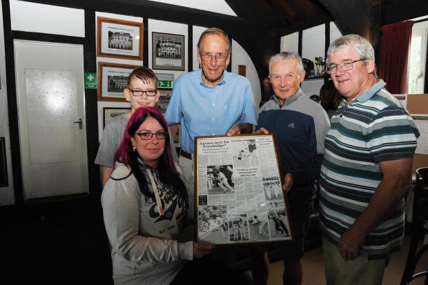 Celebration of Life Michael Bristow former Sports Ed of Wiltshire Times. Michael’s Daughter Emily with his grandson Jayden take a close look at the page of Cricket from the West Indy match that Michael  wrote and designed with Trowbridge Cricket