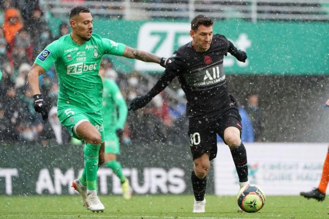 Lionel Messi (right) in action for Paris St Germain at St Etienne