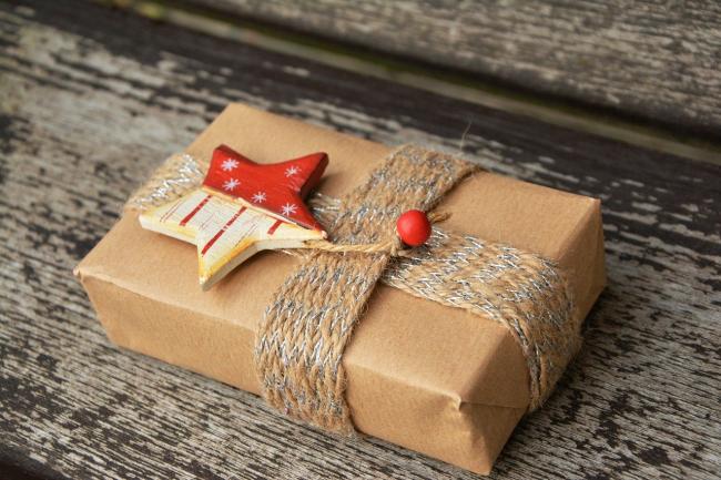Plain brown recyclable wrapping paper, pictured above. Photo via Pixabay.