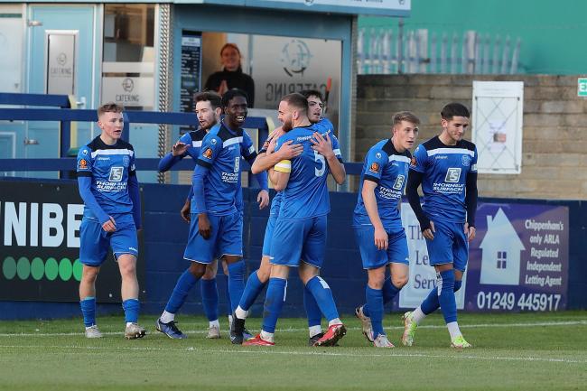 Harry Parsons celebrates scoring for Chippenham Town with Bluebirds captain, Kieran Parselle. Ricky Aguiar (right) has also netted five times since arriving on loan. Photo: Richard Chappell