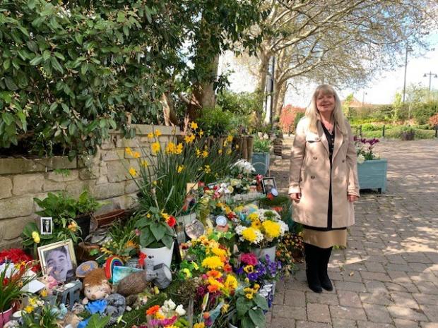The Wiltshire Gazette and Herald: Amanda Parke who lost her 19 year old son Matthew at at the Calne Pocket Park shrine to the boys who died