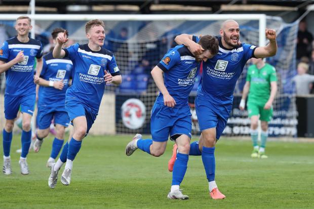 Alex Bray runs off celebrating his goal against Oxford City in National League South on Monday  Pic: Richard Chappell