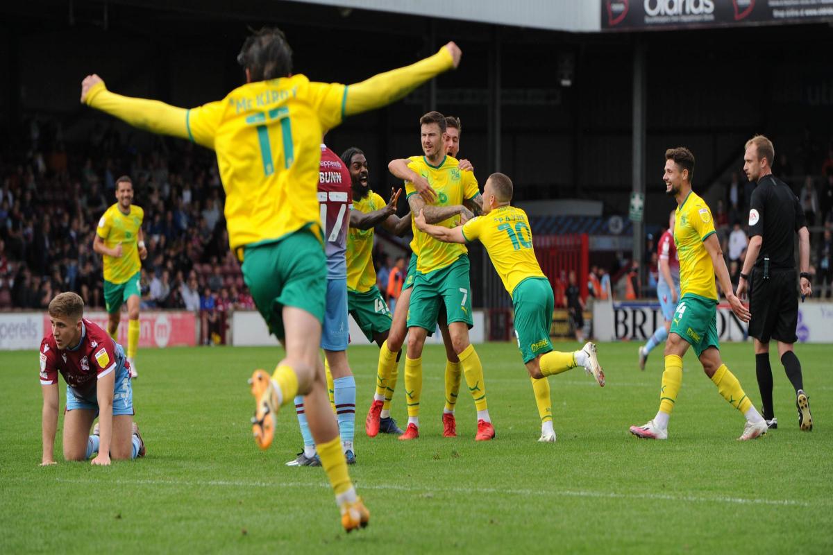 Swindon's Ben Gladwin celebrates scoring his sides second goal with team-mates during the match between Scunthorpe United and Swindon Town at Glanford Park, Sands Venue  Stadium , Scunthorpe, England on Saturday the 14th of August 2021. The EFL