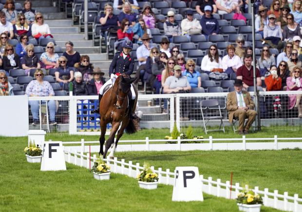 The Wiltshire Gazette and Herald: Laura Collett on London 52 during the dressage test on day three of the Badminton Horse Trials held at The Badminton Estate, Gloucestershire. Picture date: Friday May 6, 2022. Photo: PA/Steve Parsons