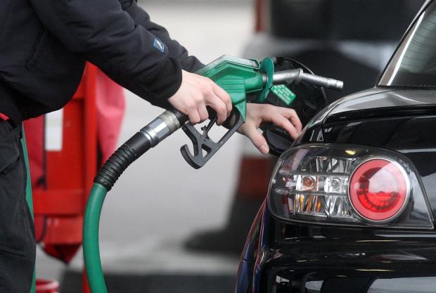 The Wiltshire Gazette and Herald: Someone using a fuel pump at a petrol station (PA)