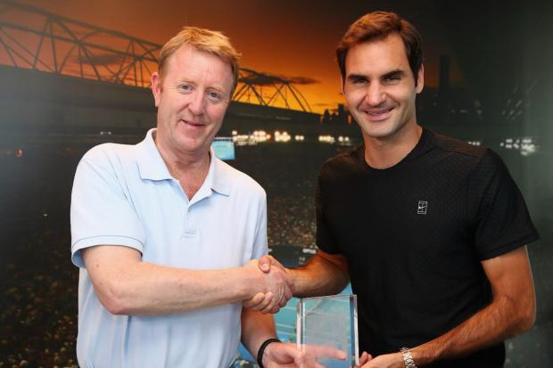 Mike Dickson, the Daily Mail’s long-serving tennis correspondent (pictured with Roger Federer) has died at the age of 59 (handout photo via Associatied Newspapers)