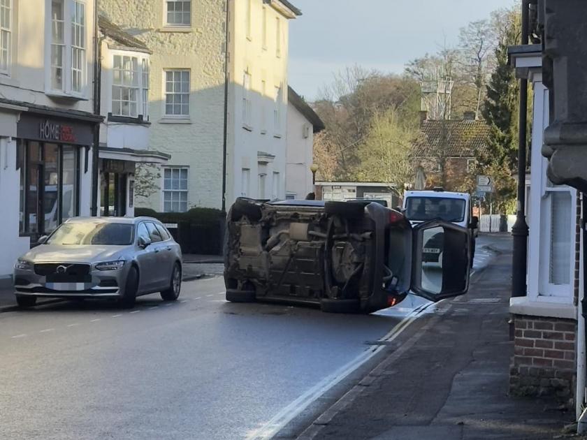 Overturned car closes busy Pewsey High Street 