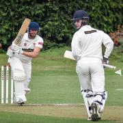 Hickerton and Slade making runs for Chippenham..Cricket action from Trowbridge v Chippenham. Chippenham  are batting .  (Delayed start due to wet wicket)..Photo by www.gphillipsphotography.com GP1736.
