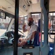 Bus driver of the 217 in Marlborough Nigel Peck shows off his gas mask and says passengers are all wearing masks