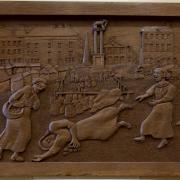 The smiting of Ruth Pierce in a woodcut displayed at Devizes Town Hall. Photo - Devizes Town Council.