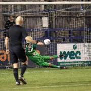 Chippenham Town goalkeeper Will Henry saves Luke O'Neill's 73rd-minute penalty during the Bluebirds' 0-0 draw at home to Ebbsfleet United on Tuesday night                 Photo: Richard Chappell