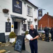 Alan Walters in front of the pub with the arbitration decision