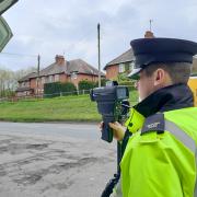 An officer carrying out speed checks on the A346 at Ogbourne St Andrew