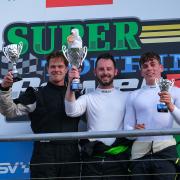 Malmesbury's Louis Harvey proudly holds up his third-place trophy at Brands Hatch last weekend