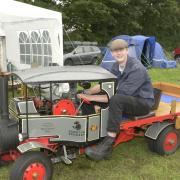 Bradford on Avon sixth former Charlie Gennard  in charge of his family's quarter-scale model of steam lorry