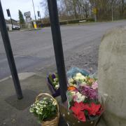 Floral tributes left at the scene of a fatal crash in Chippenham