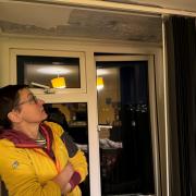 Barbara Czekanska wants the roof above her flat to be urgently repaired after a leak returned and part of a ceiling collapsed
