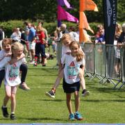 Children from 26  schools took part in a triathlon to raise money for charity