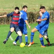 Action from Gloucester Conservative FC (blue) clash against Sporting Box. PICTURE: CADER ESOF