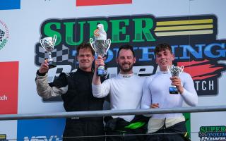 Malmesbury's Louis Harvey proudly holds up his third-place trophy at Brands Hatch last weekend