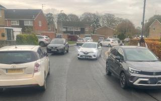Cars parked on Queens Crescent, Chippenham, blocking a bus