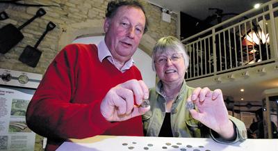 Athelstan Museum chairman Roger Griffin and treasurer Miranda Ford with the Roman coins found in Milbourne